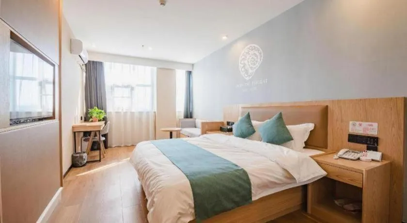 Bed in Shell Hotel Bozhou Lixin County Passenger Center