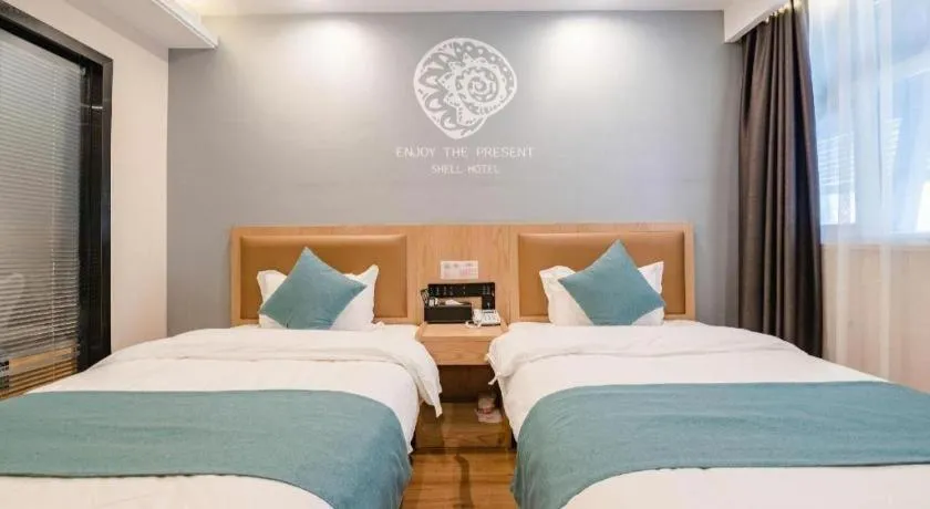 Bed in Shell Hotel Bozhou Lixin County Passenger Center