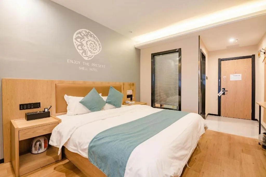 Bed in Shell Hotel Bozhou Lixin County Passenger Center