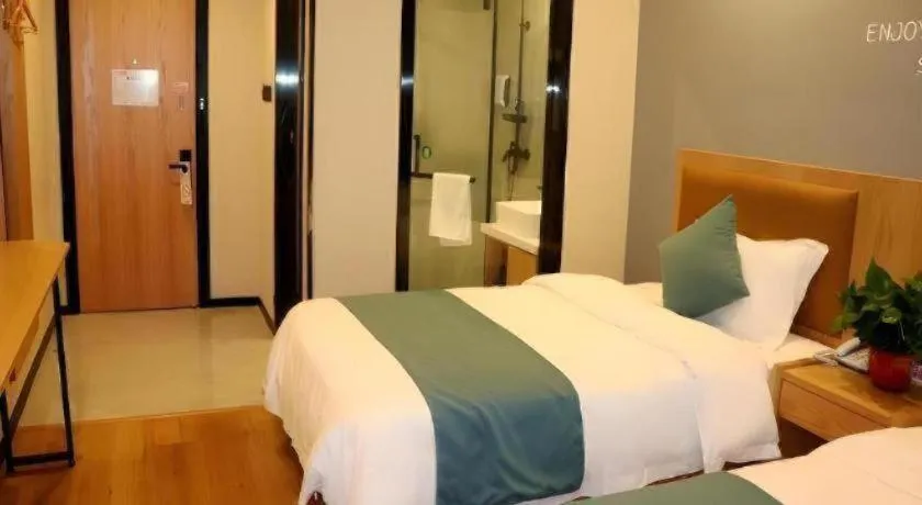 Bed in Shell Hotel Bozhou Lixin County Passenger Center