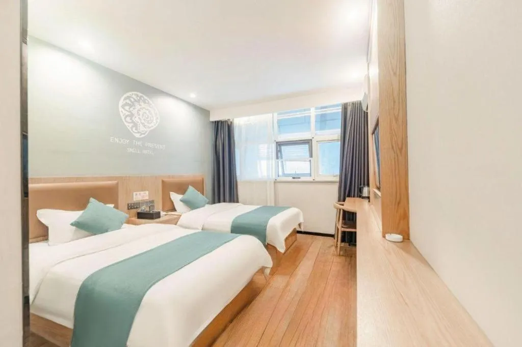 Bed in Shell Hotel Bozhou Lixin County Passenger Center