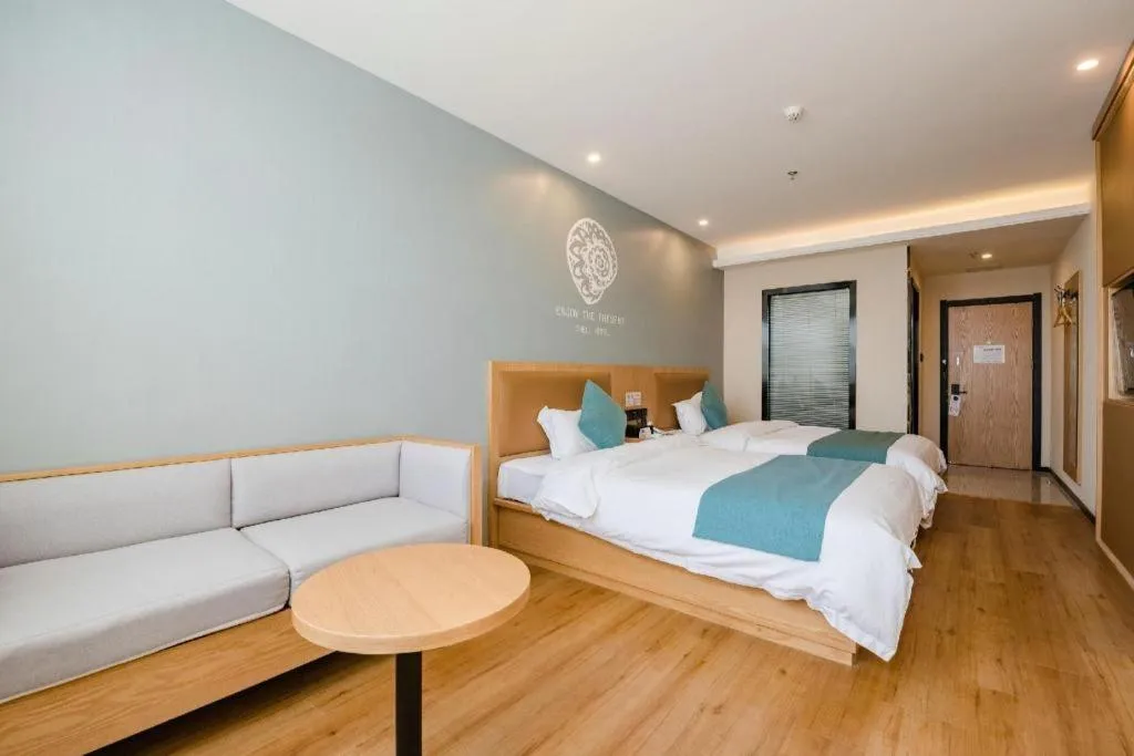 Bed in Shell Hotel Bozhou Lixin County Passenger Center