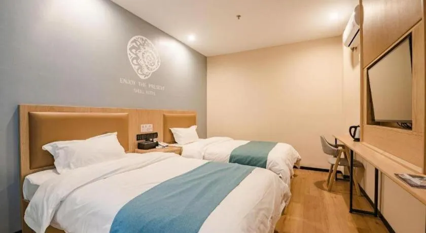 Bed in Shell Hotel Bozhou Lixin County Passenger Center