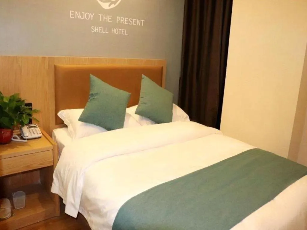 Bed in Shell Hotel Bozhou Lixin County Passenger Center