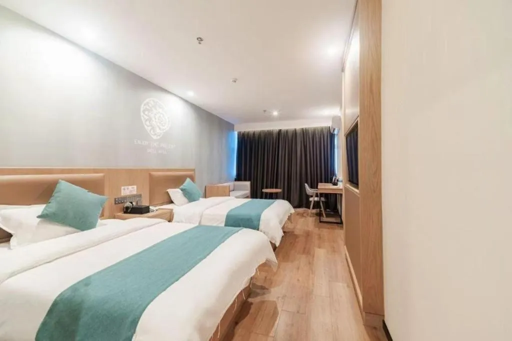Bed in Shell Hotel Bozhou Lixin County Passenger Center