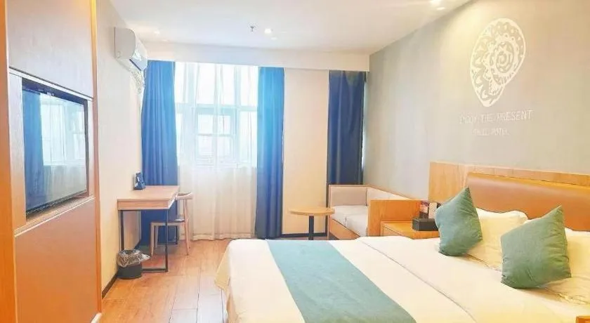 Bed in Shell Hotel Bozhou Lixin County Passenger Center