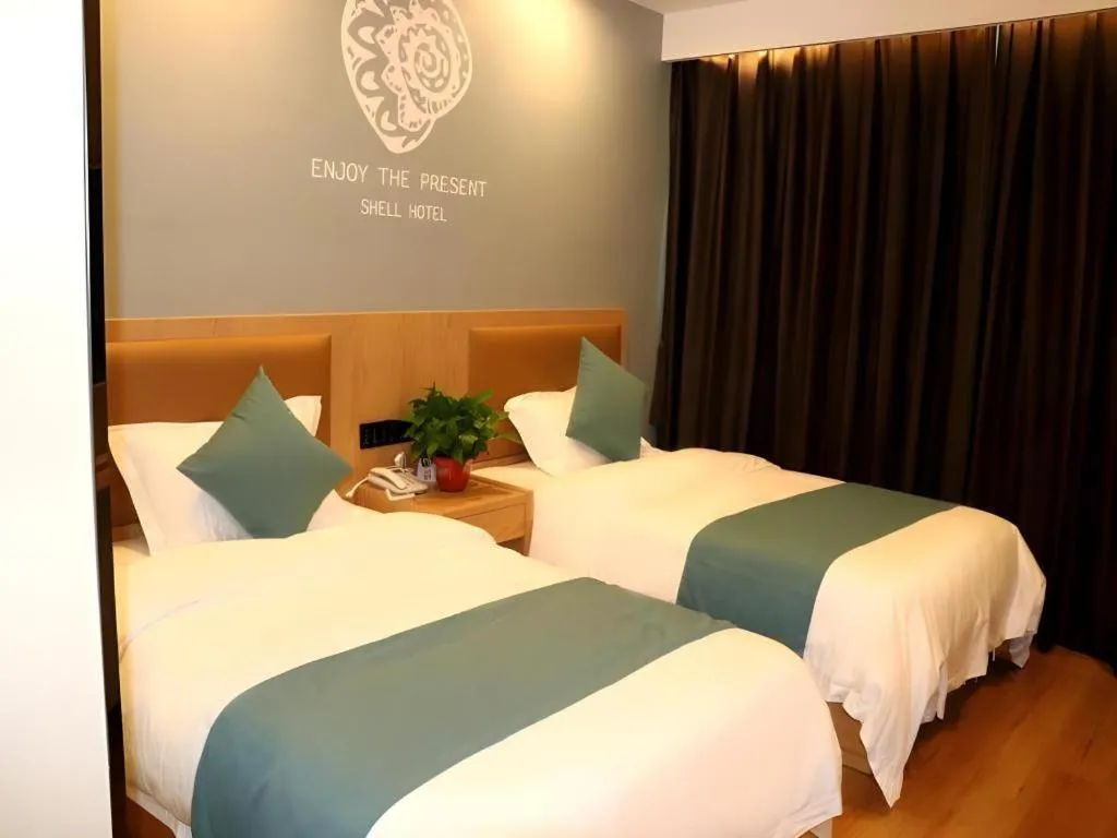 Bed in Shell Hotel Bozhou Lixin County Passenger Center