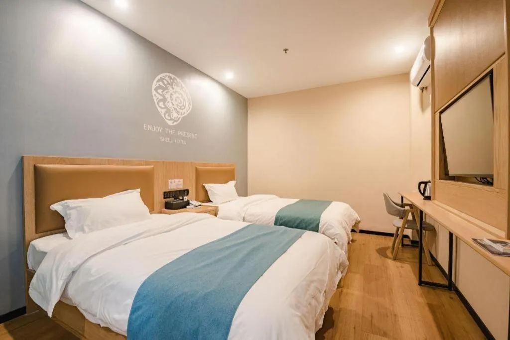 Bed in Shell Hotel Bozhou Lixin County Passenger Center