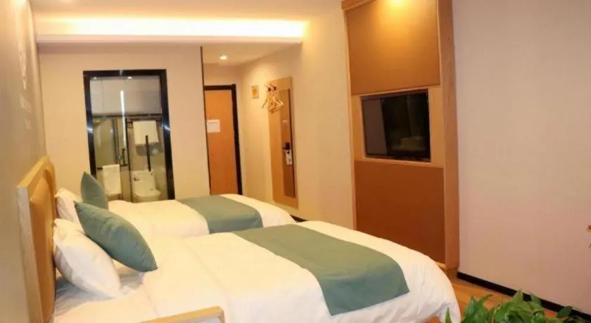 Bed in Shell Hotel Bozhou Lixin County Passenger Center