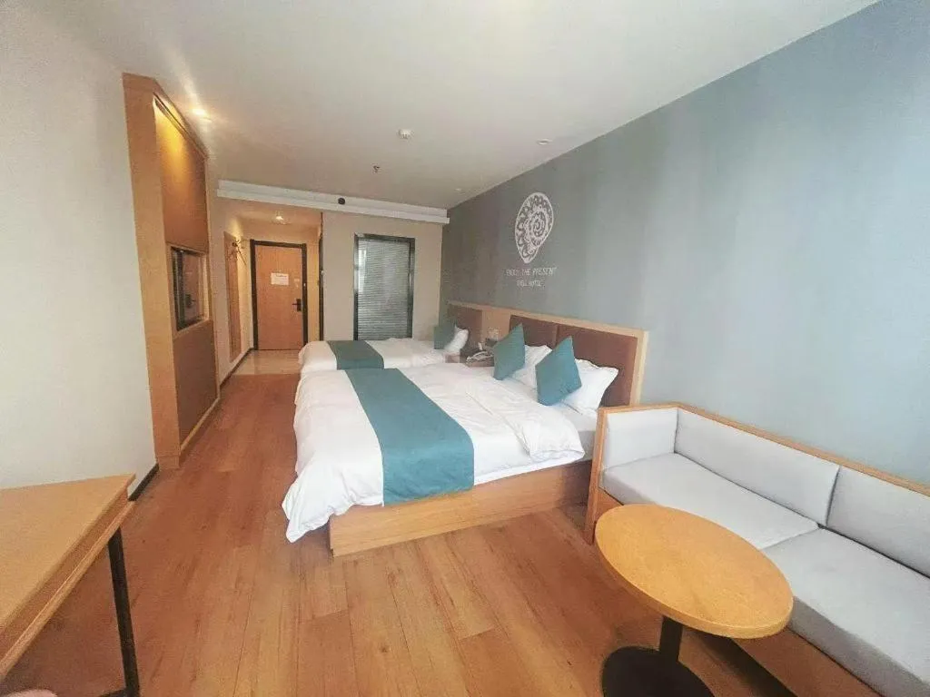 Bed in Shell Hotel Bozhou Lixin County Passenger Center