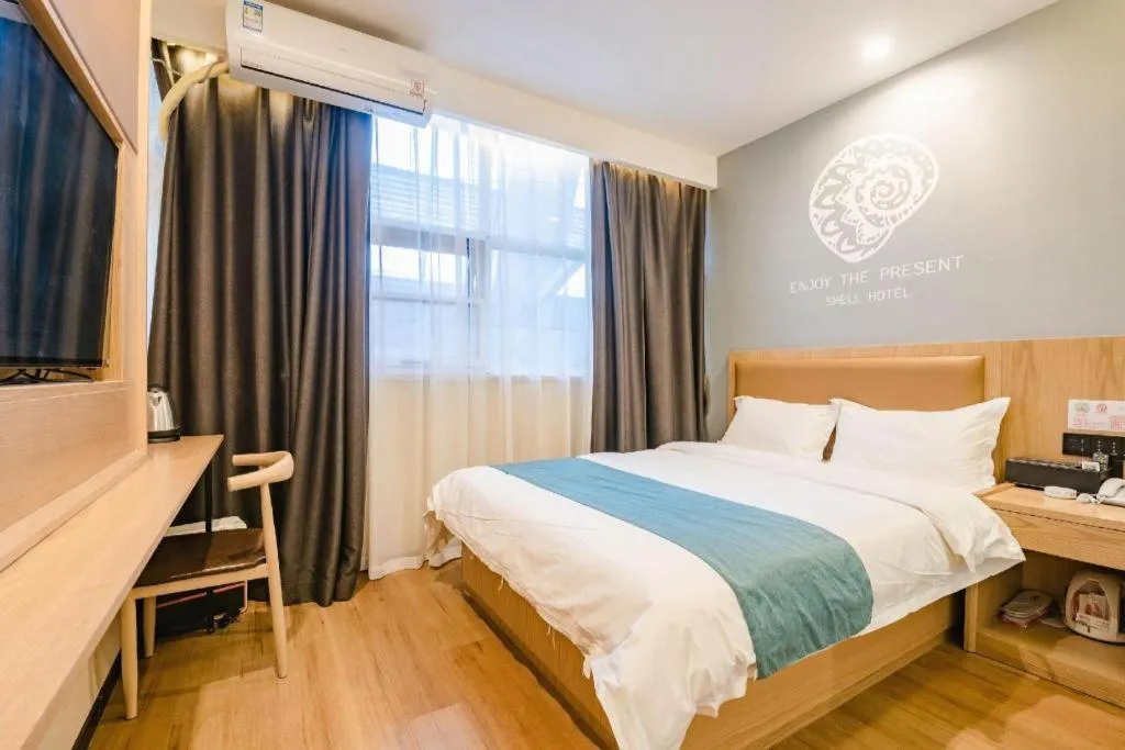 Bed in Shell Hotel Bozhou Lixin County Passenger Center