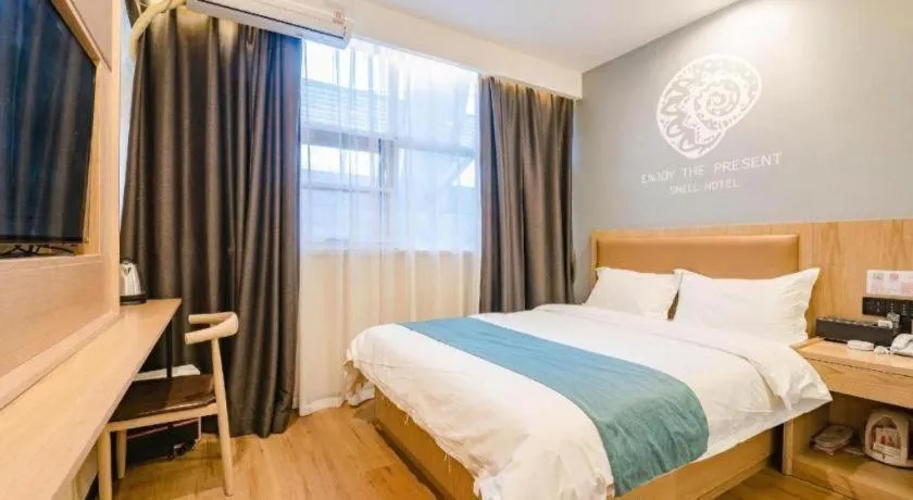 Bed in Shell Hotel Bozhou Lixin County Passenger Center