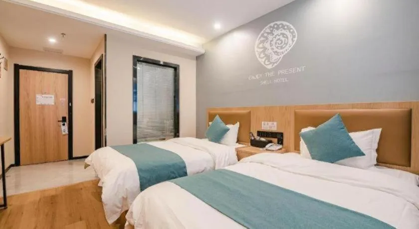 Bed in Shell Hotel Bozhou Lixin County Passenger Center