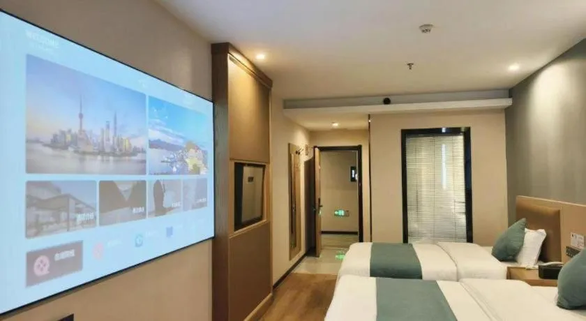 Bed in Shell Hotel Bozhou Lixin County Passenger Center