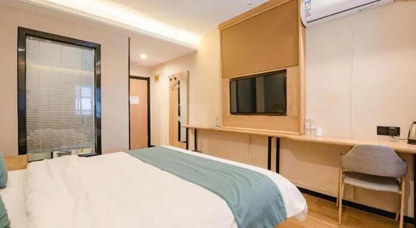 Bed in Shell Hotel Bozhou Lixin County Passenger Center