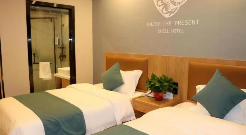 Bed in Shell Hotel Bozhou Lixin County Passenger Center
