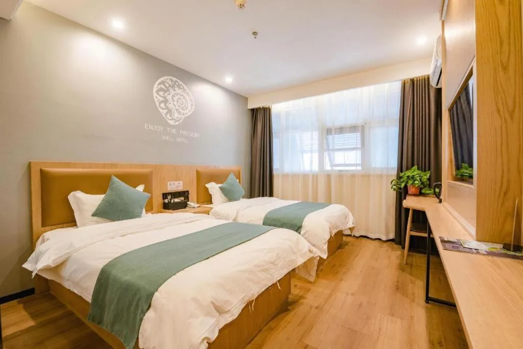 Bed in Shell Hotel Bozhou Lixin County Passenger Center