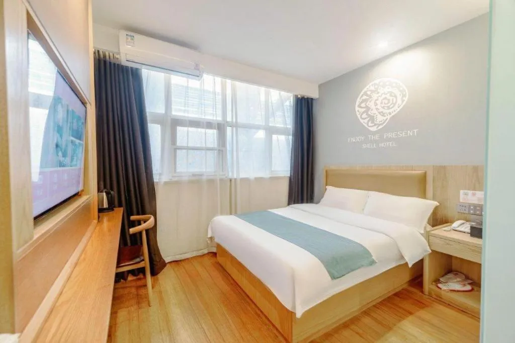 Bed in Shell Hotel Bozhou Lixin County Passenger Center