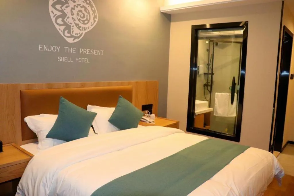 Bed in Shell Hotel Bozhou Lixin County Passenger Center