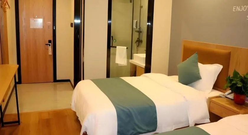 Bed in Shell Hotel Bozhou Lixin County Passenger Center