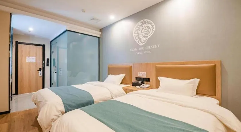 Bed in Shell Hotel Bozhou Lixin County Passenger Center