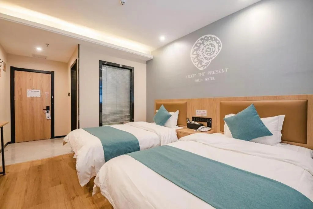 Bed in Shell Hotel Bozhou Lixin County Passenger Center
