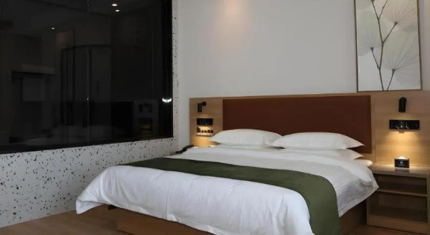 Bed in Green Tree Inn Express Inner Mongolia Ulan Qab High-Speed Railway Station