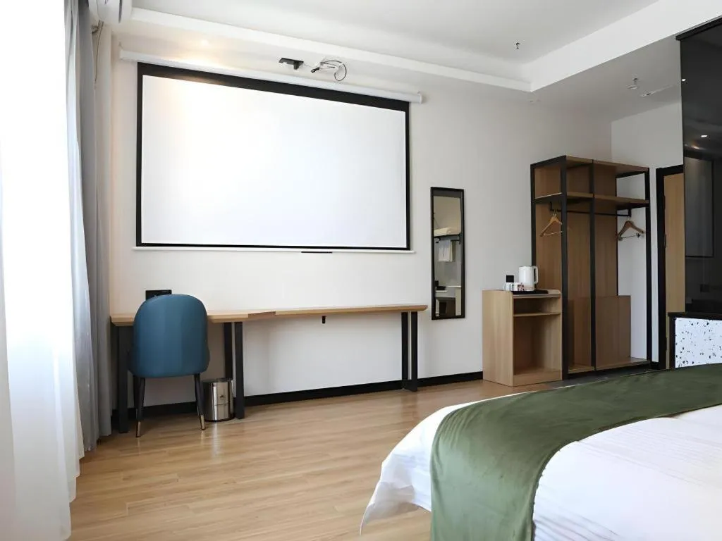 Bed in Green Tree Inn Express Inner Mongolia Ulan Qab High-Speed Railway Station