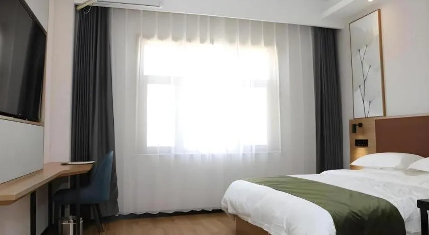 Bed in Green Tree Inn Express Inner Mongolia Ulan Qab High-Speed Railway Station