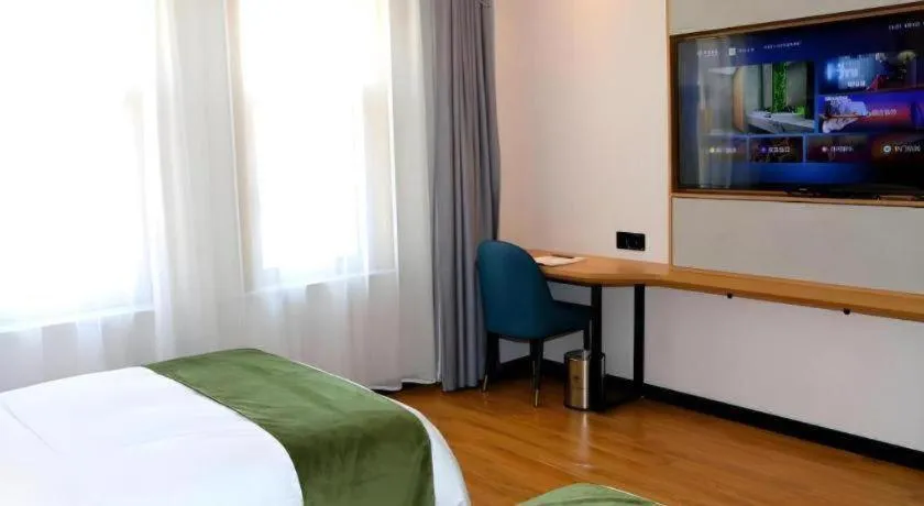 Bed in Green Tree Inn Express Inner Mongolia Ulan Qab High-Speed Railway Station