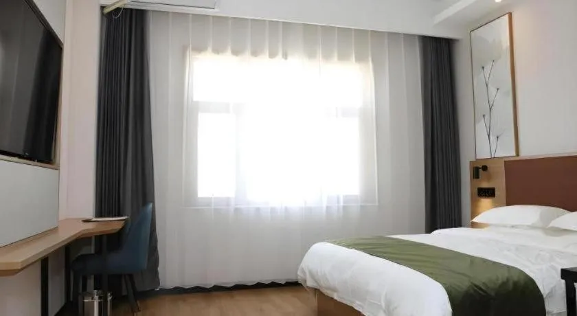 Bed in Green Tree Inn Express Inner Mongolia Ulan Qab High-Speed Railway Station