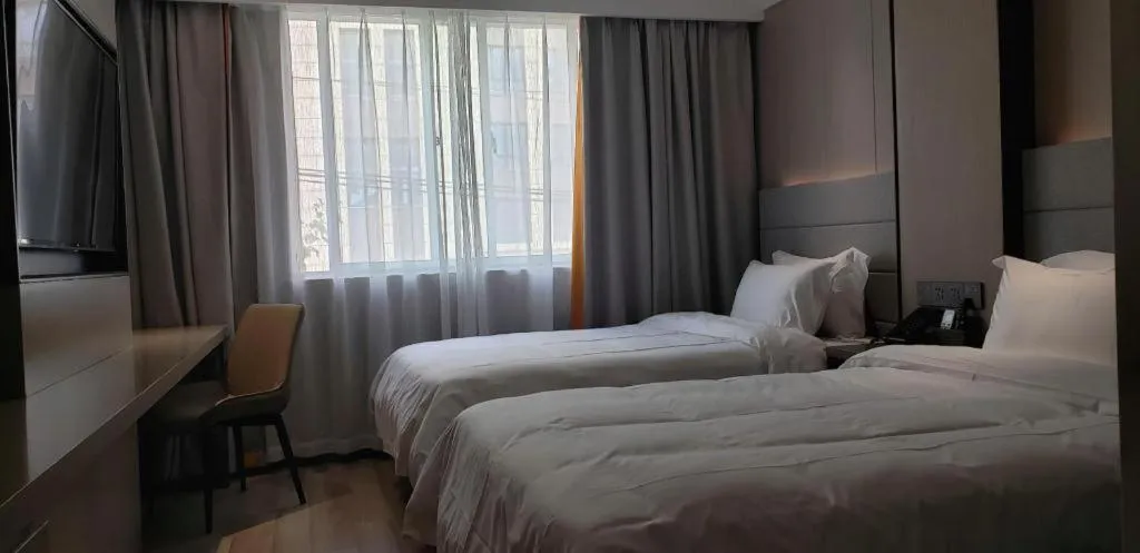 Bed in Gya Hotel Shanghai Xizang Bei Road Metro Station