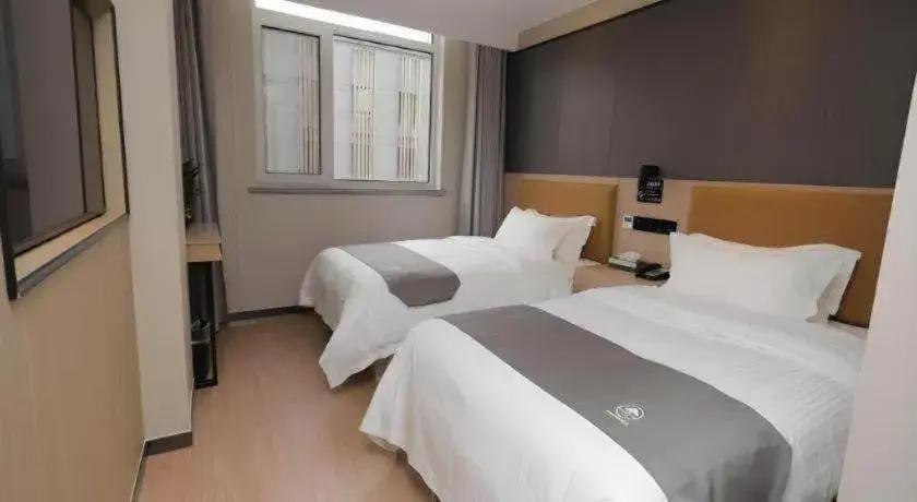 Bed in Green Tree Inn Express Tangshan Kaiping District Government Bed in Green Tree Inn Express Tangshan Kaiping District Government