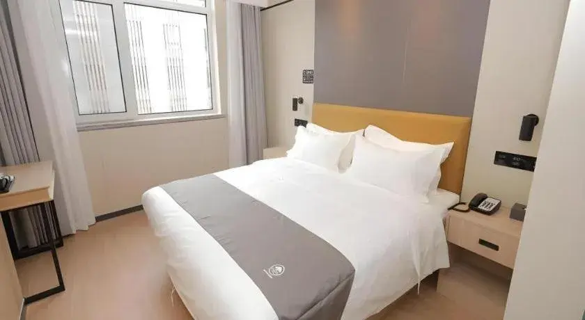 Bed in Green Tree Inn Express Tangshan Kaiping District Government Bed in Green Tree Inn Express Tangshan Kaiping District Government