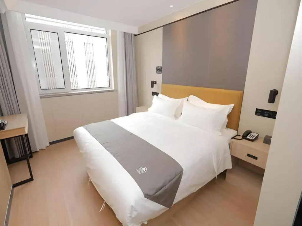 Bed in Green Tree Inn Express Tangshan Kaiping District Government Bed in Green Tree Inn Express Tangshan Kaiping District Government