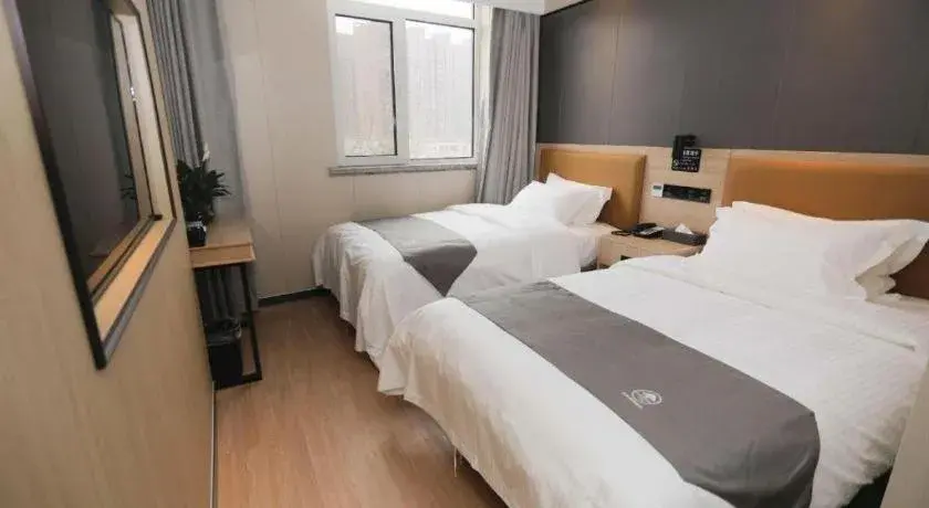 Bed in Green Tree Inn Express Tangshan Kaiping District Government Bed in Green Tree Inn Express Tangshan Kaiping District Government