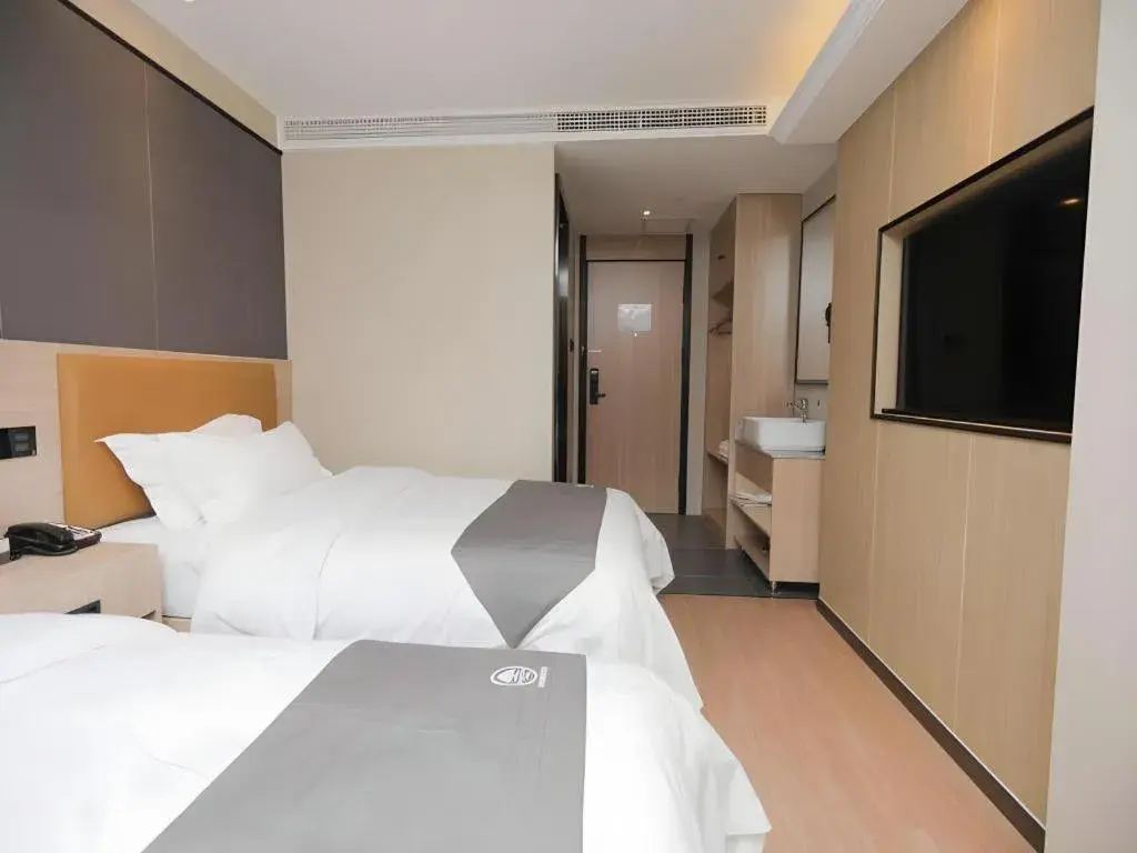 Bed in Green Tree Inn Express Tangshan Kaiping District Government Bed in Green Tree Inn Express Tangshan Kaiping District Government