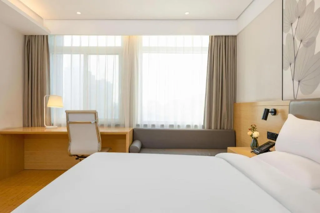 Bed in Green Tree Inn Xuzhou Tongshan Wanda Plaza Yuquanhe Metro Station