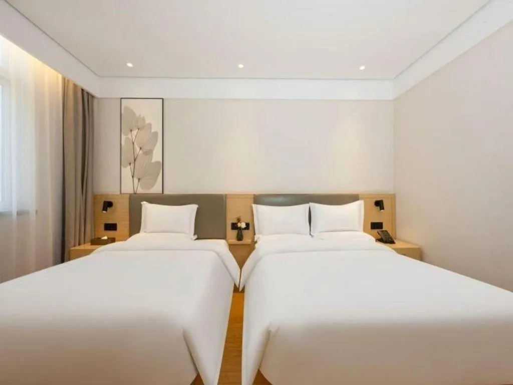 Bed in Green Tree Inn Xuzhou Tongshan Wanda Plaza Yuquanhe Metro Station