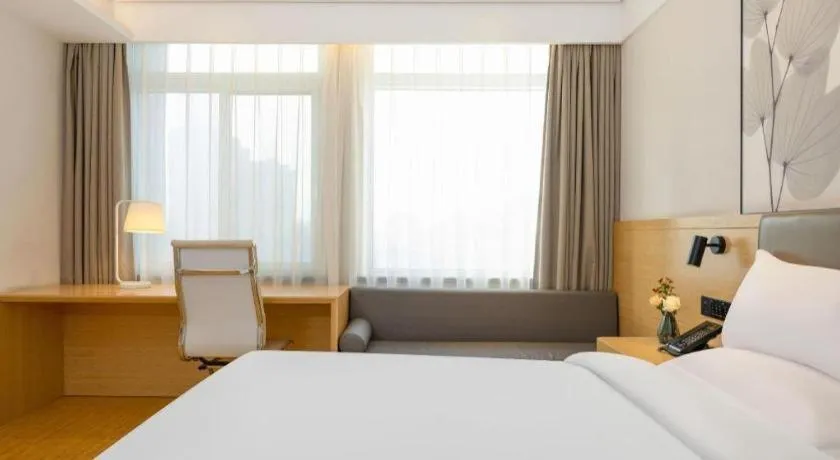 Bed in Green Tree Inn Xuzhou Tongshan Wanda Plaza Yuquanhe Metro Station