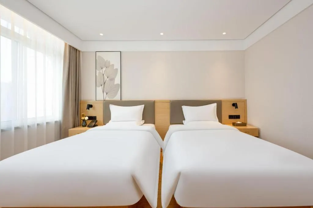 Bed in Green Tree Inn Xuzhou Tongshan Wanda Plaza Yuquanhe Metro Station