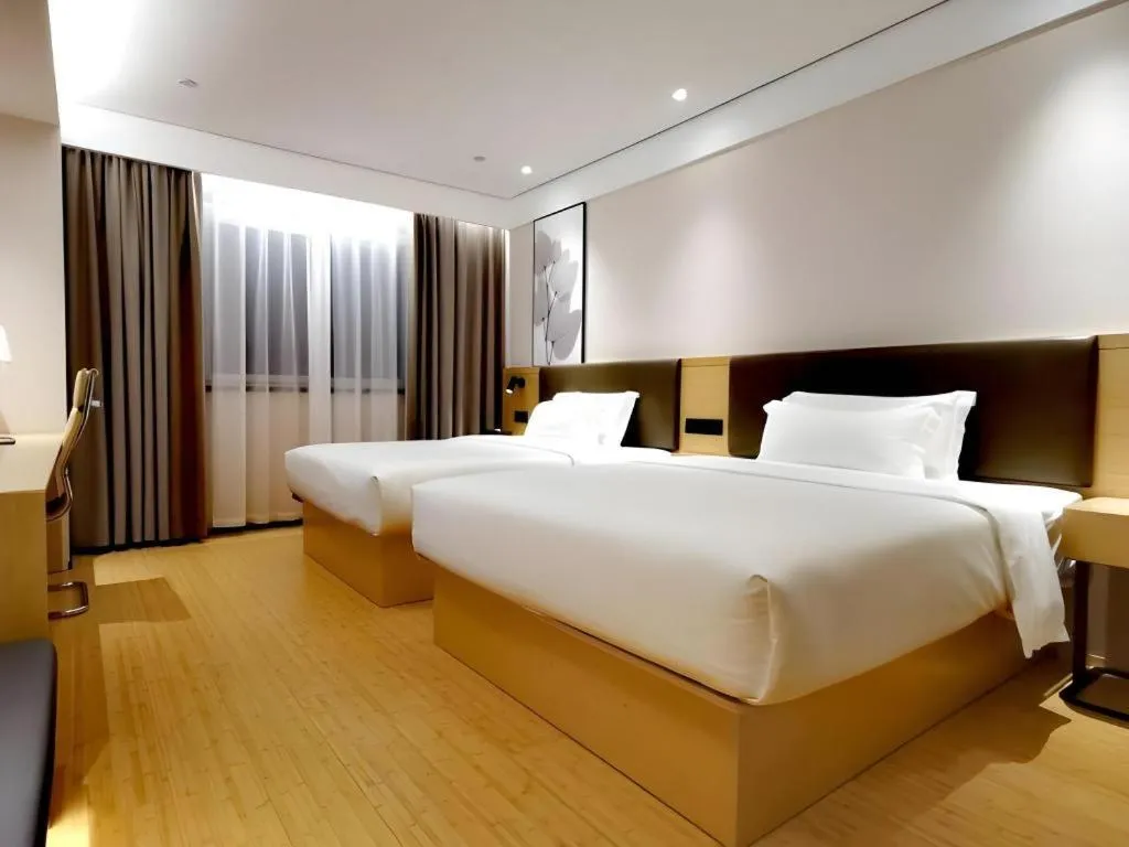 Bed in Green Tree Inn Xuzhou Tongshan Wanda Plaza Yuquanhe Metro Station