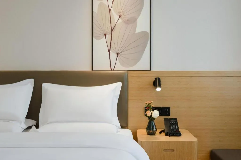 Bed in Green Tree Inn Xuzhou Tongshan Wanda Plaza Yuquanhe Metro Station