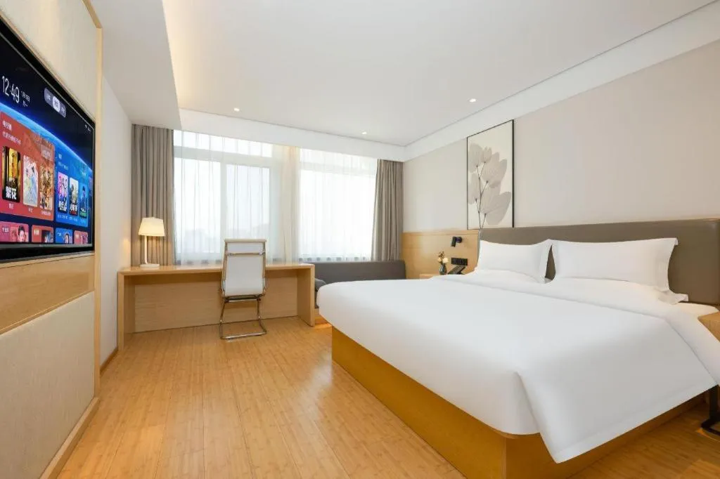 Bed in Green Tree Inn Xuzhou Tongshan Wanda Plaza Yuquanhe Metro Station