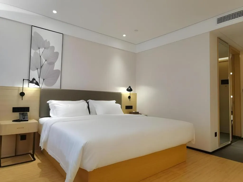 Bed in Green Tree Inn Xuzhou Tongshan Wanda Plaza Yuquanhe Metro Station