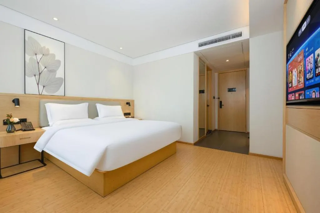 Bed in Green Tree Inn Xuzhou Tongshan Wanda Plaza Yuquanhe Metro Station