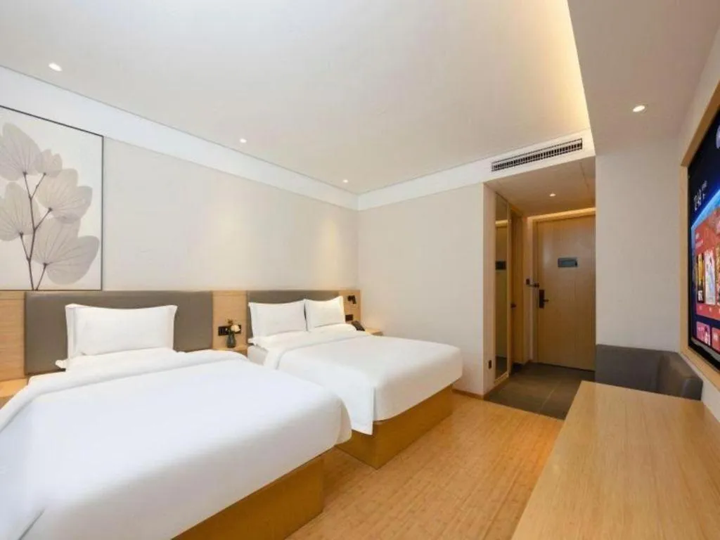 Bed in Green Tree Inn Xuzhou Tongshan Wanda Plaza Yuquanhe Metro Station