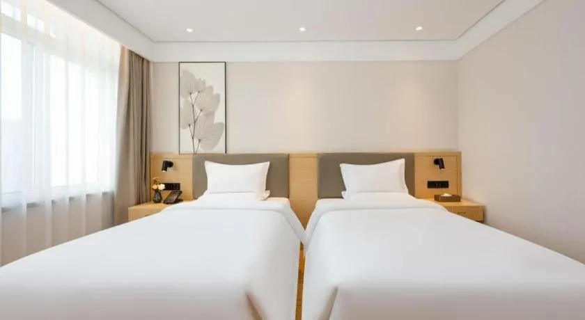 Bed in Green Tree Inn Xuzhou Tongshan Wanda Plaza Yuquanhe Metro Station