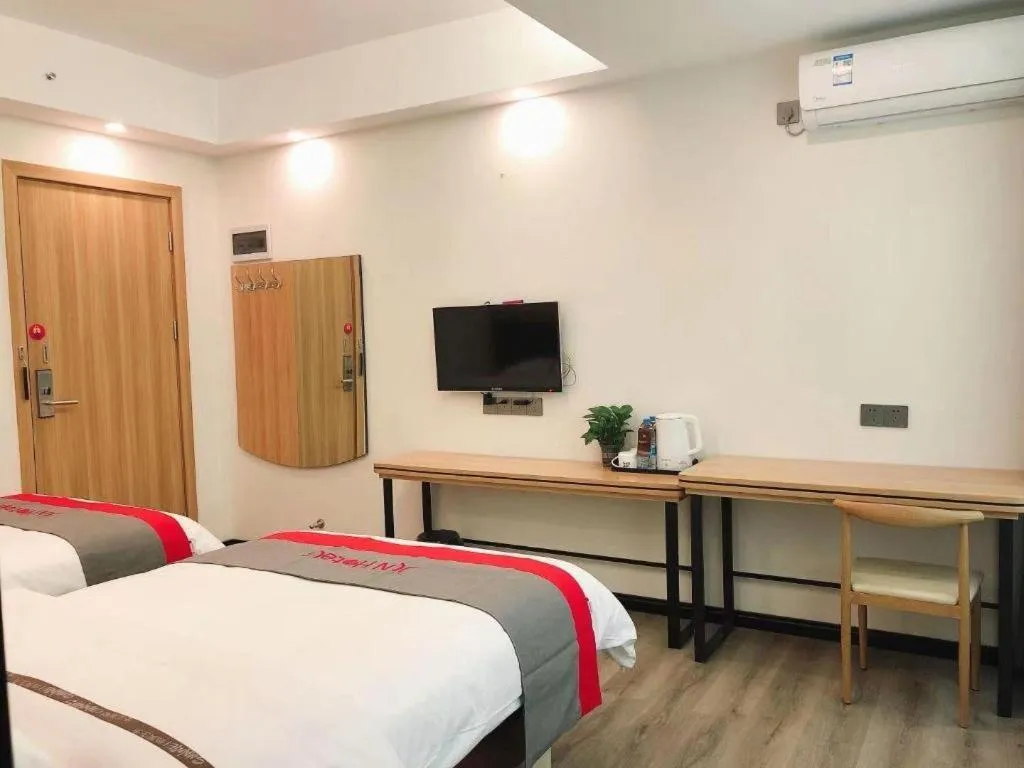 Bed in Jun Hotel Guangdong Zhanjiang Xiashan South Railway Station