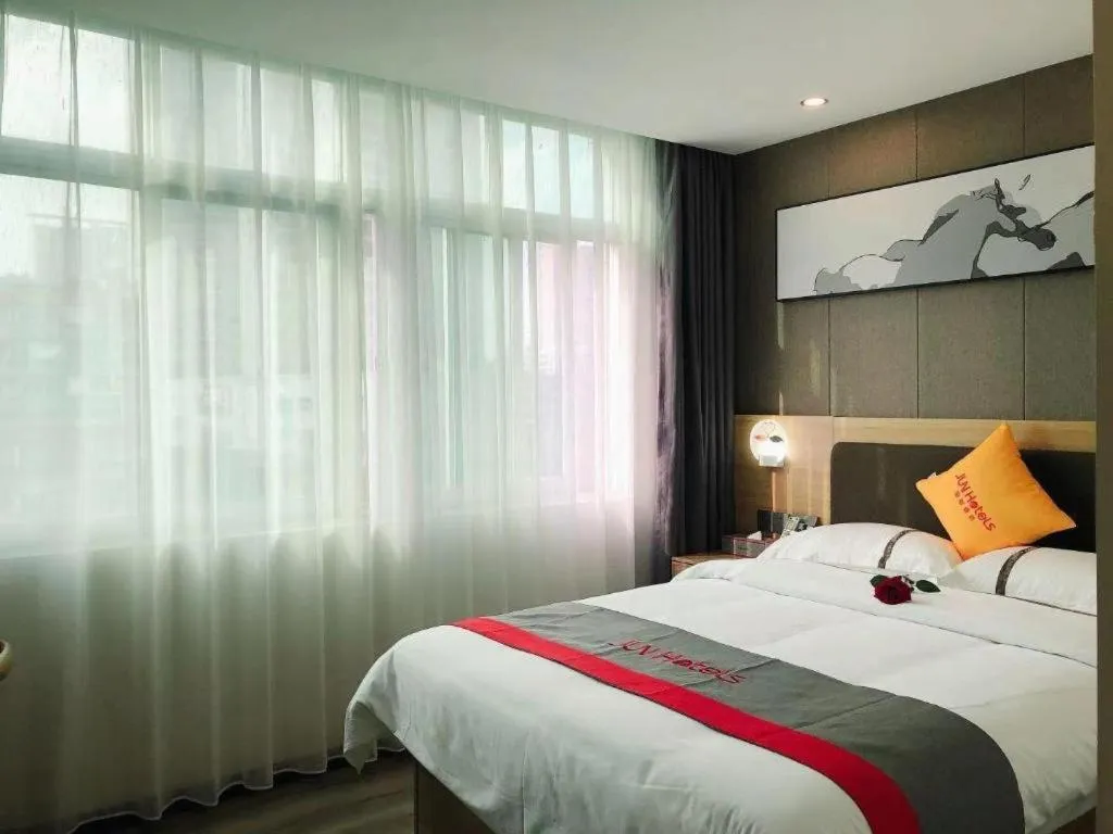 Bed in Jun Hotel Guangdong Zhanjiang Xiashan South Railway Station